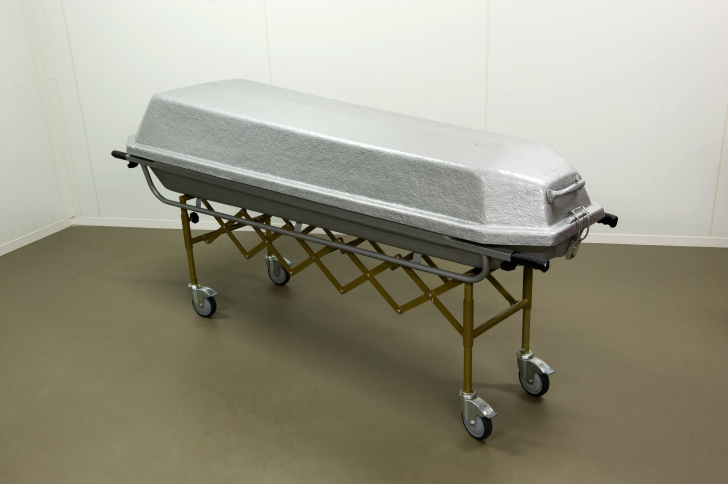 A coffin to transport a dead body in a morgue