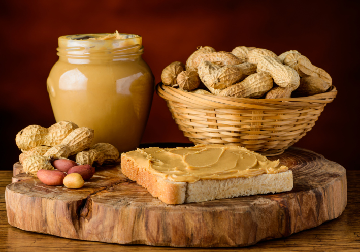 Smooth Peanut butter in jar and spread on bread