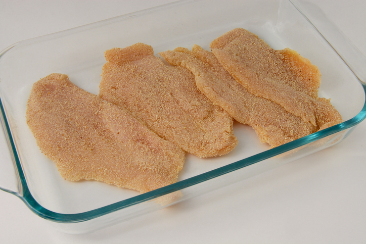 Breaded raw chicken breasts