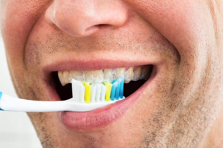Smiling Man With Toothbrush