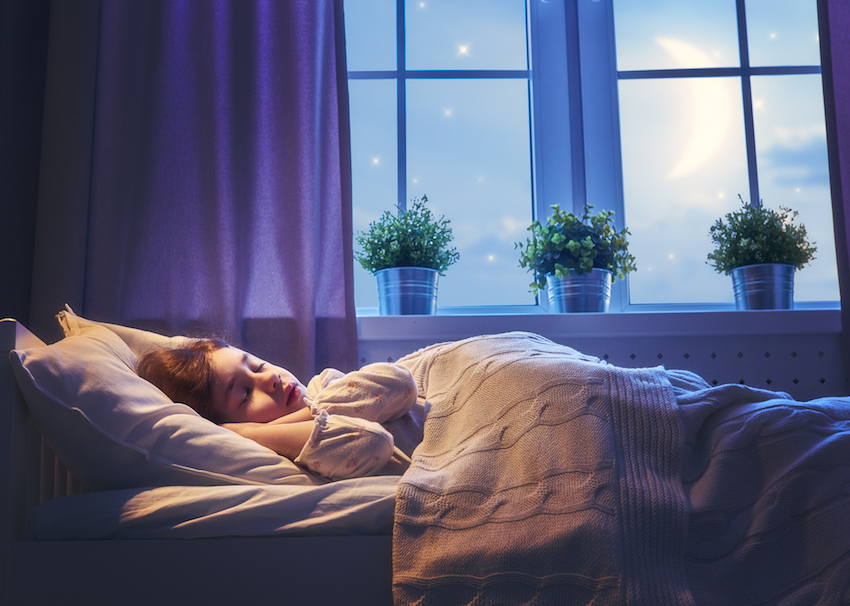 girl sleeping in the bed