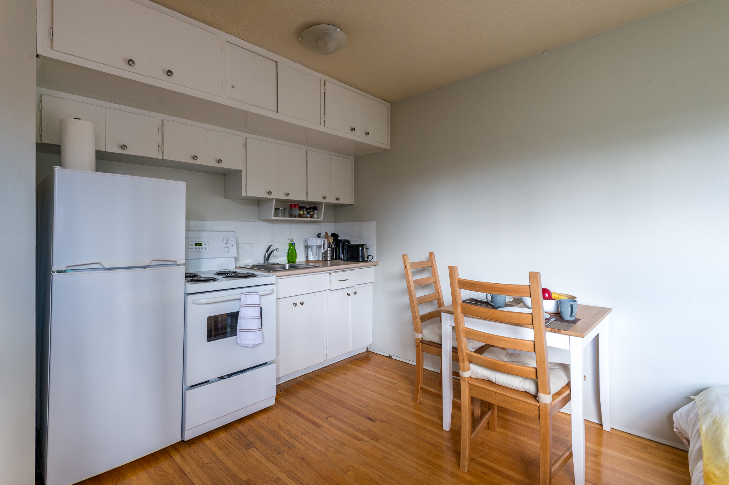 Cozy kitchen with a small dinner table. Interior design.