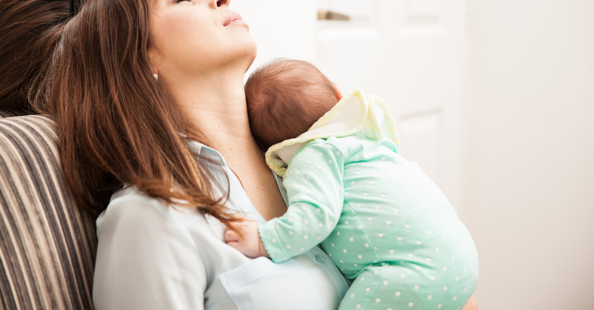 Mom falling asleep with her baby