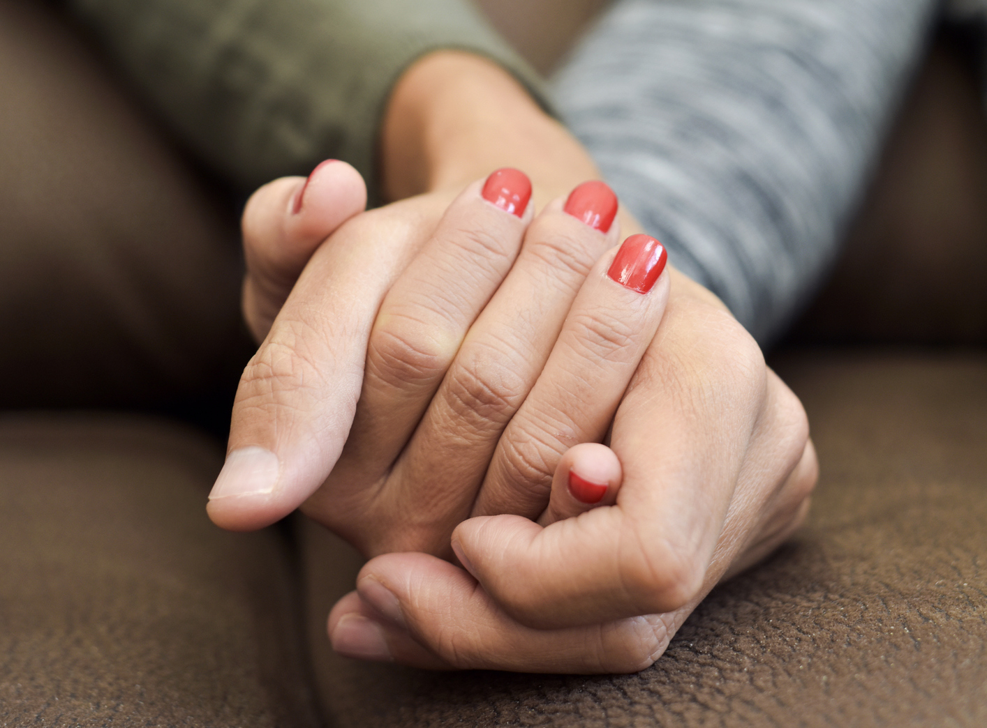 man and woman holding hands