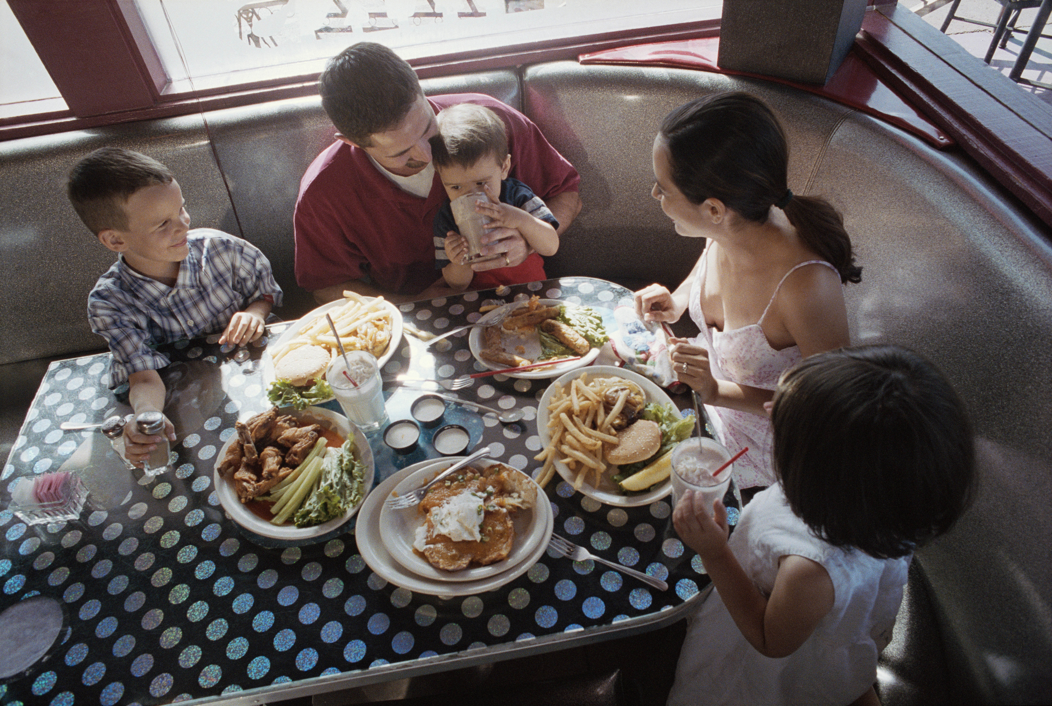 Family eating in diner