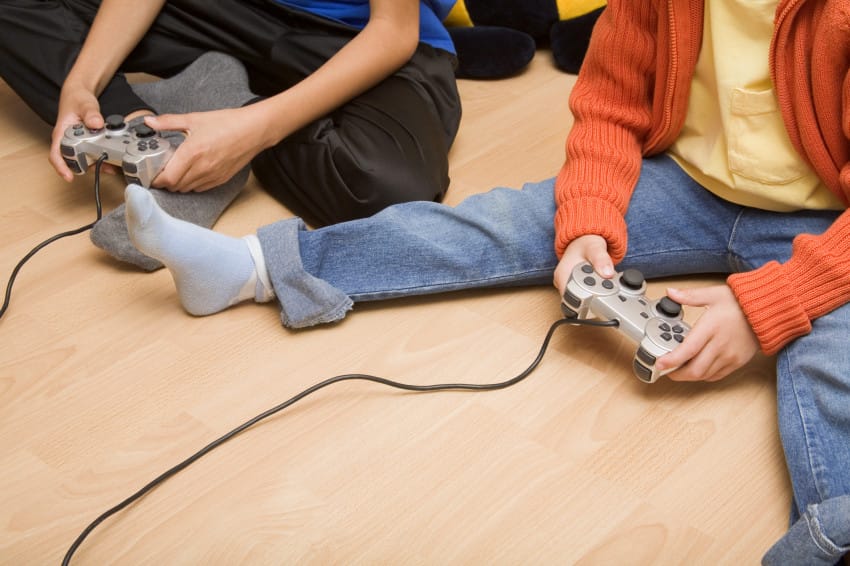 Children with game controllers