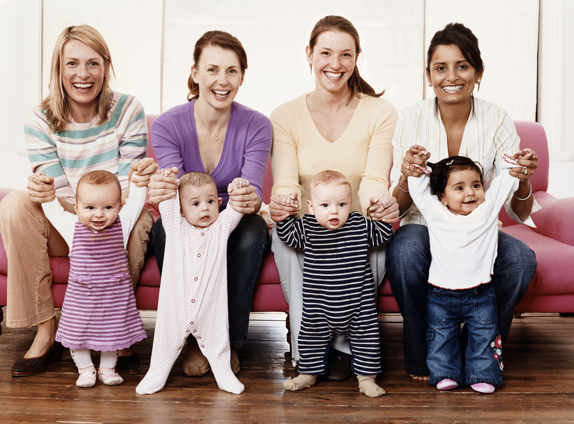 Portrait of Four Young Mothers with Their Babies