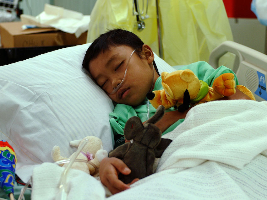 US_Navy_050214-N-0357S-060_An_11-year_old_Indonesian_boy_rests_in_a_hospital_bed_in_the_Intensive_Care_Unit_aboard_the_Milit.jpg