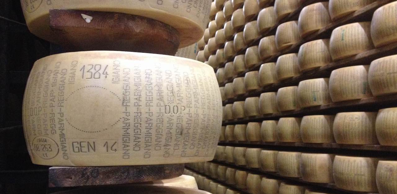 Unapproved_Parmigiano-Reggiano_wheel_on_shelf