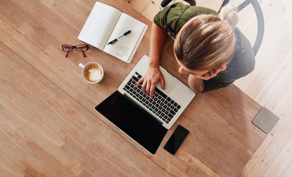 Woman surfing internet at coffee shop