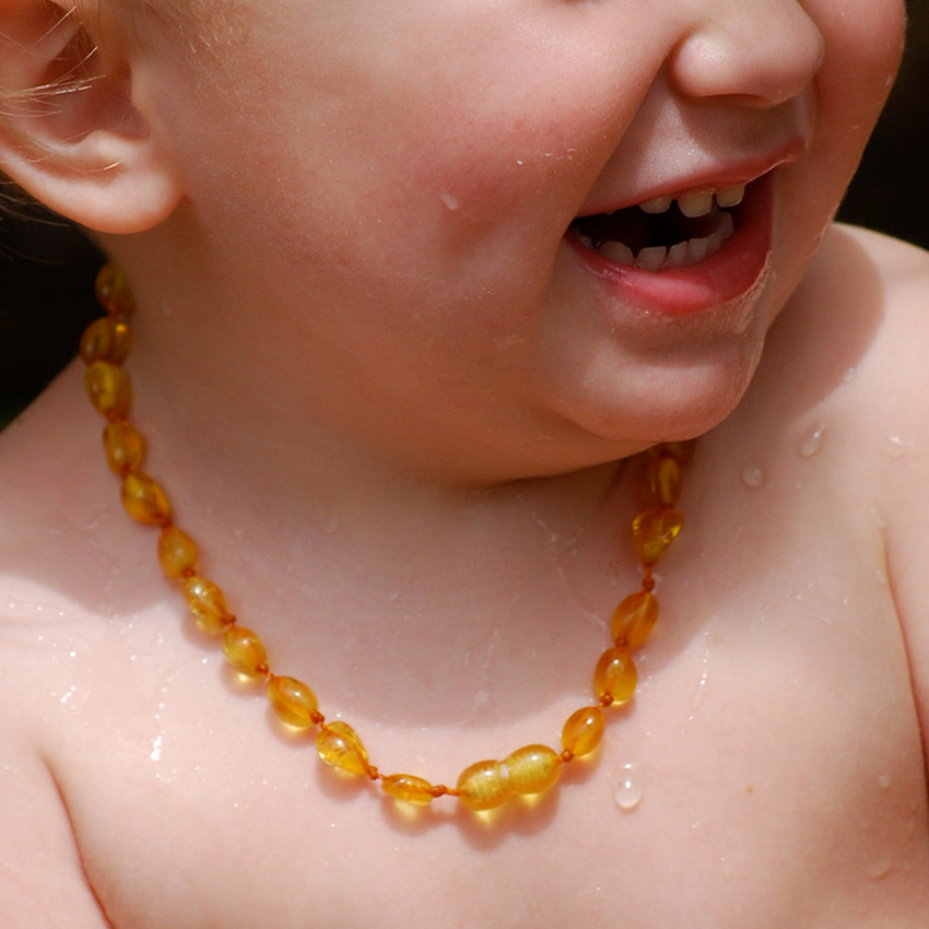 amber-teething-necklace-baby-wearing.jpg