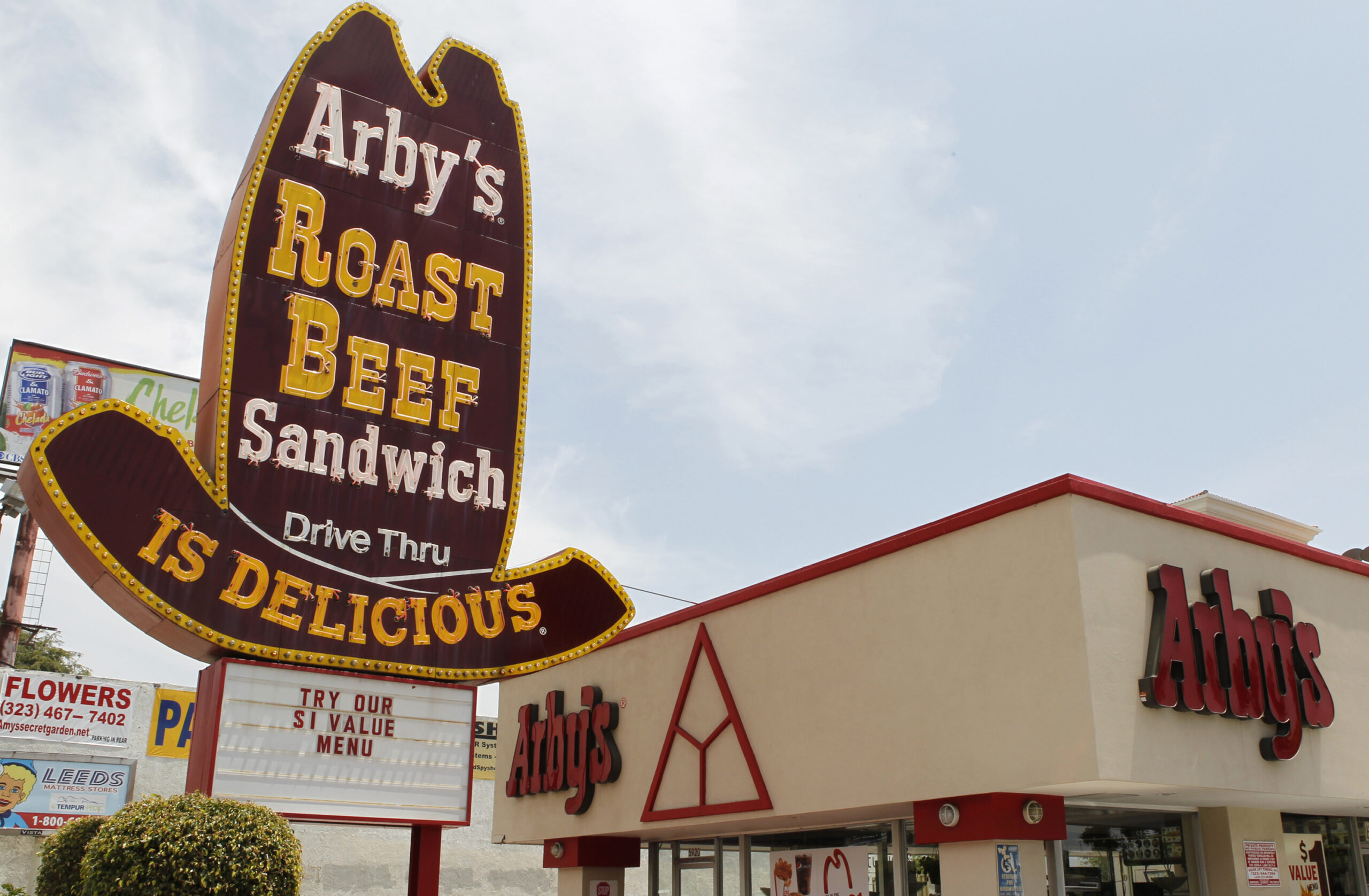 A SIGNAGE PROMOTES ARBY FAST FOOD RESTAURANT'S NEW $1 MENU IN HOLLYWOOD