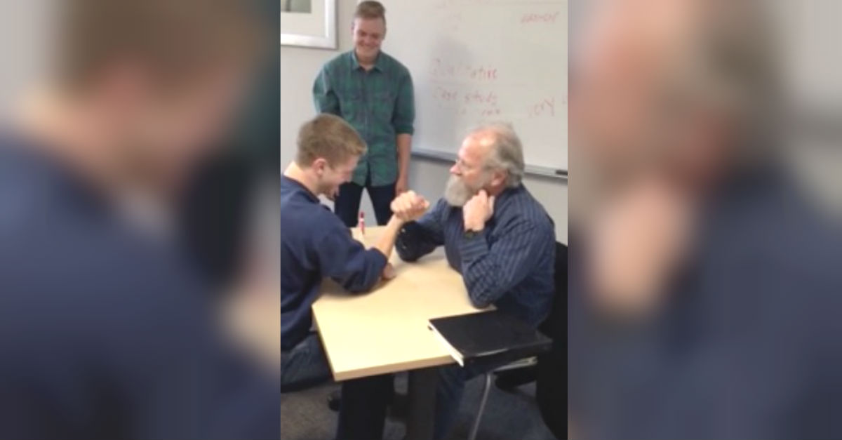 arm wrestle teacher