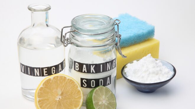 Homemade green cleaning.Lemon and baking soda on white background