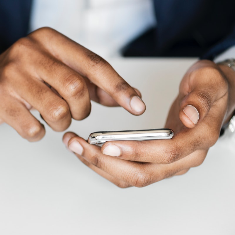 blur-businessman-cellphone-943628.jpg