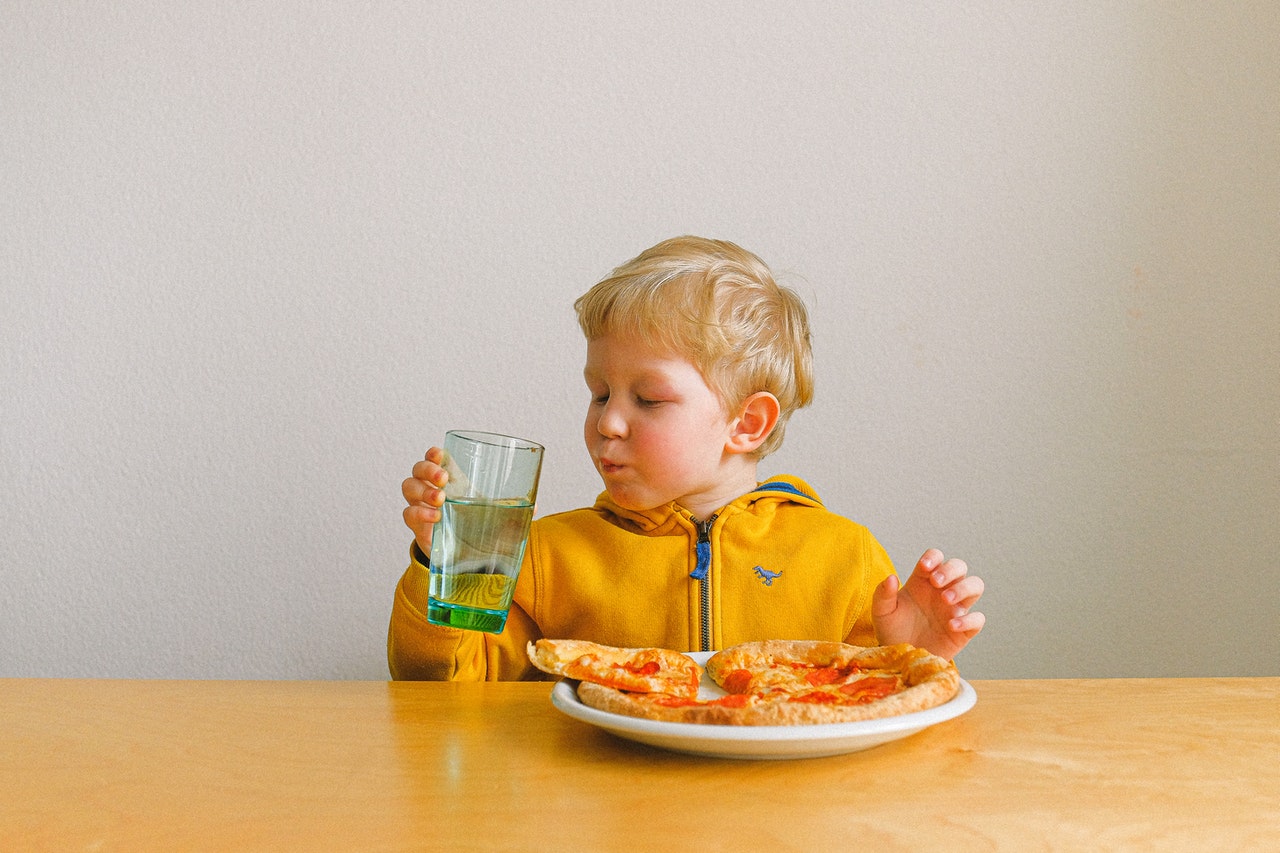 boy-holding-clear-drinking-glass-3905789.jpg
