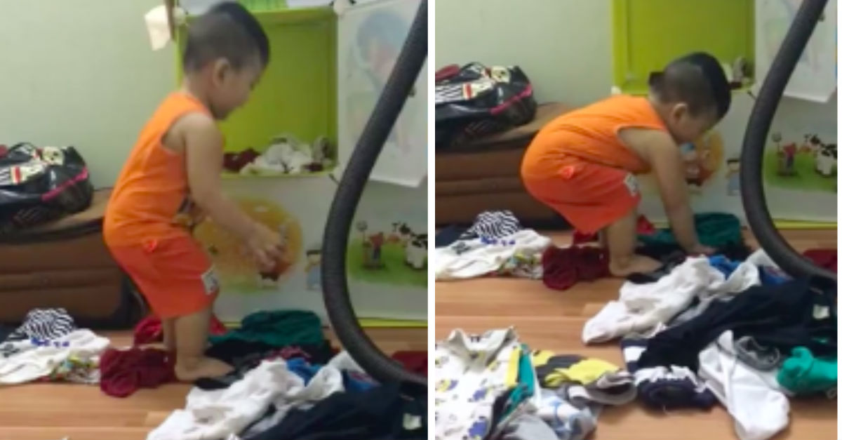 little-boy-tries-to-clean-up