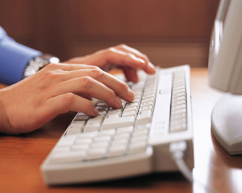 close-up-of-hands-typing-on-keyboard.jpg