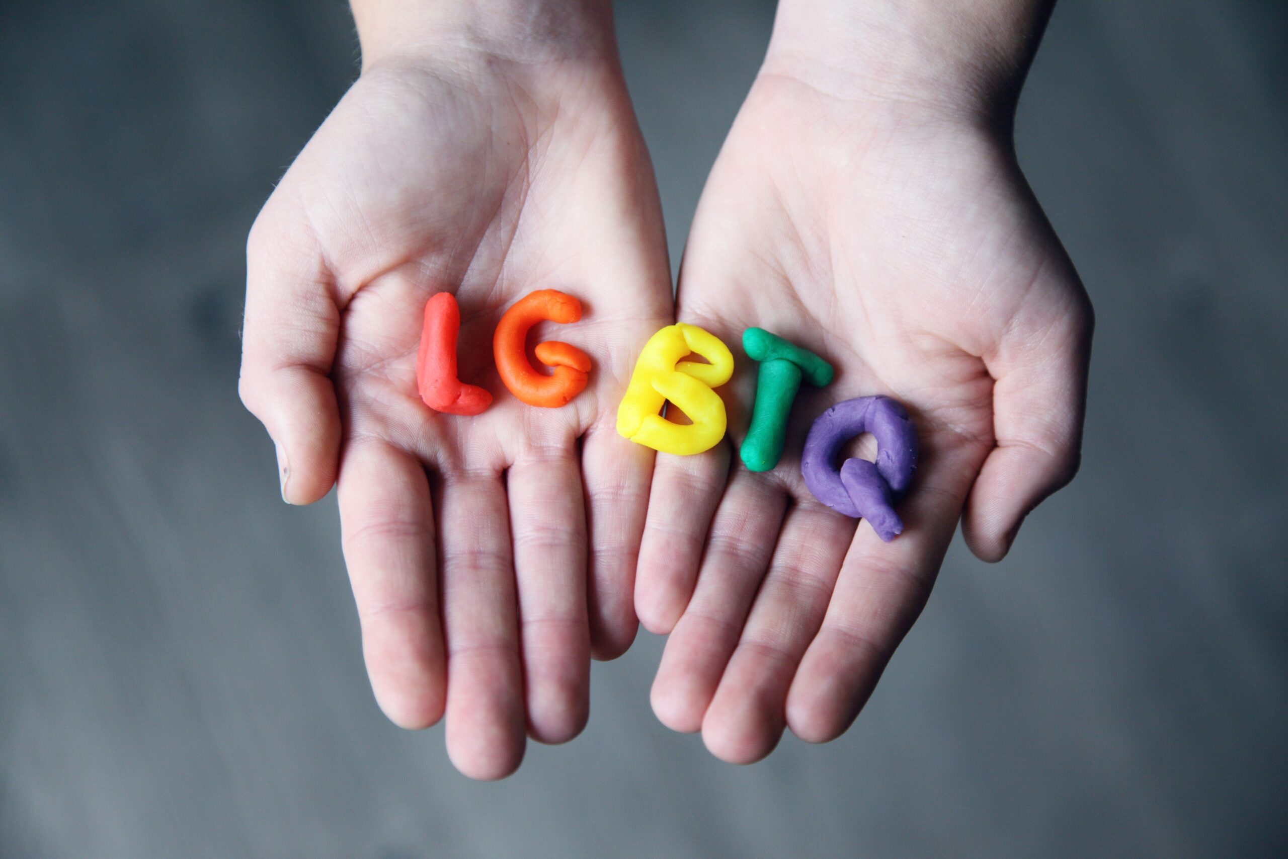 close-up-photo-of-lgbtq-letters-on-a-person-s-hands-1566842.jpg