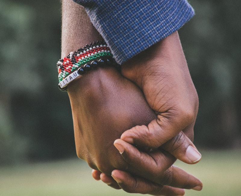 close-up-photo-of-two-person-s-holding-hands-1667849.jpg