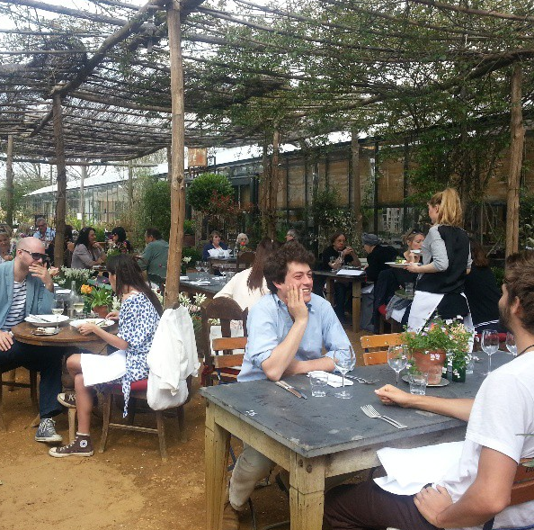customers-eating-amongst-the-flowers.png