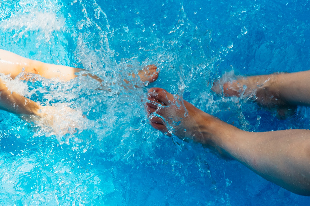 feet-water-swimming-pool-pool-101986.jpg