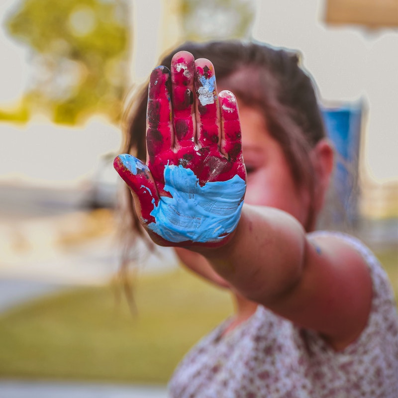 girl-hand-with-red-and-blue-paint-1259351.jpg