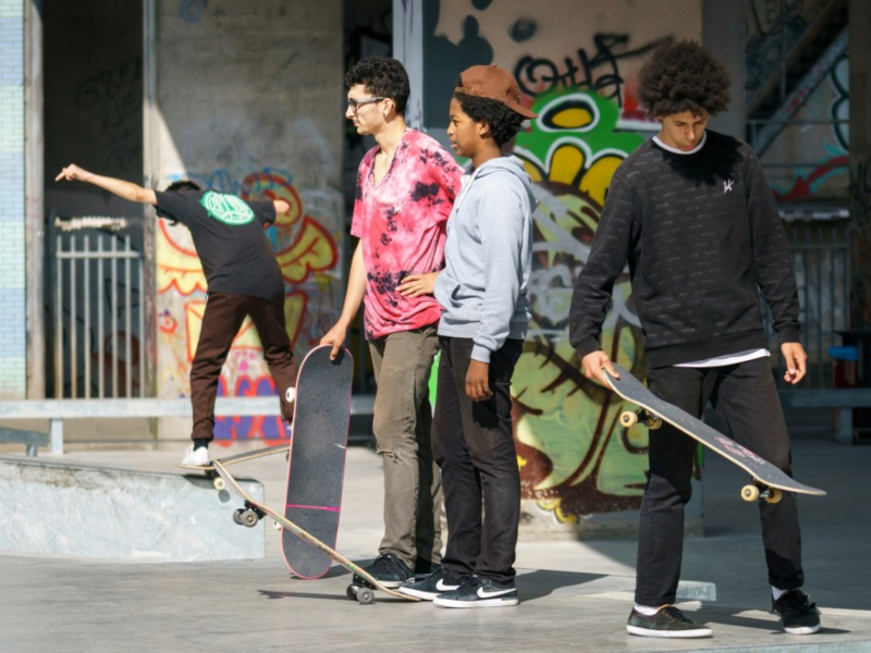 goup-of-young-kateboarders-hanging-out-at-the-official-opening-of-the-new-skateboard-park-in_t20_AVwa40-1.jpg