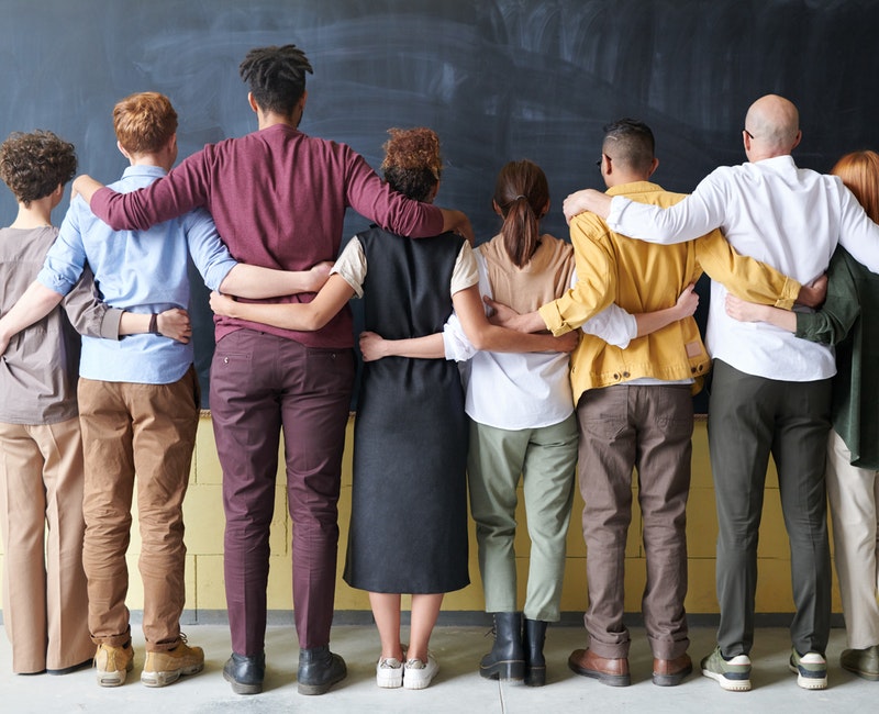 group-of-people-standing-indoors-3184396.jpg