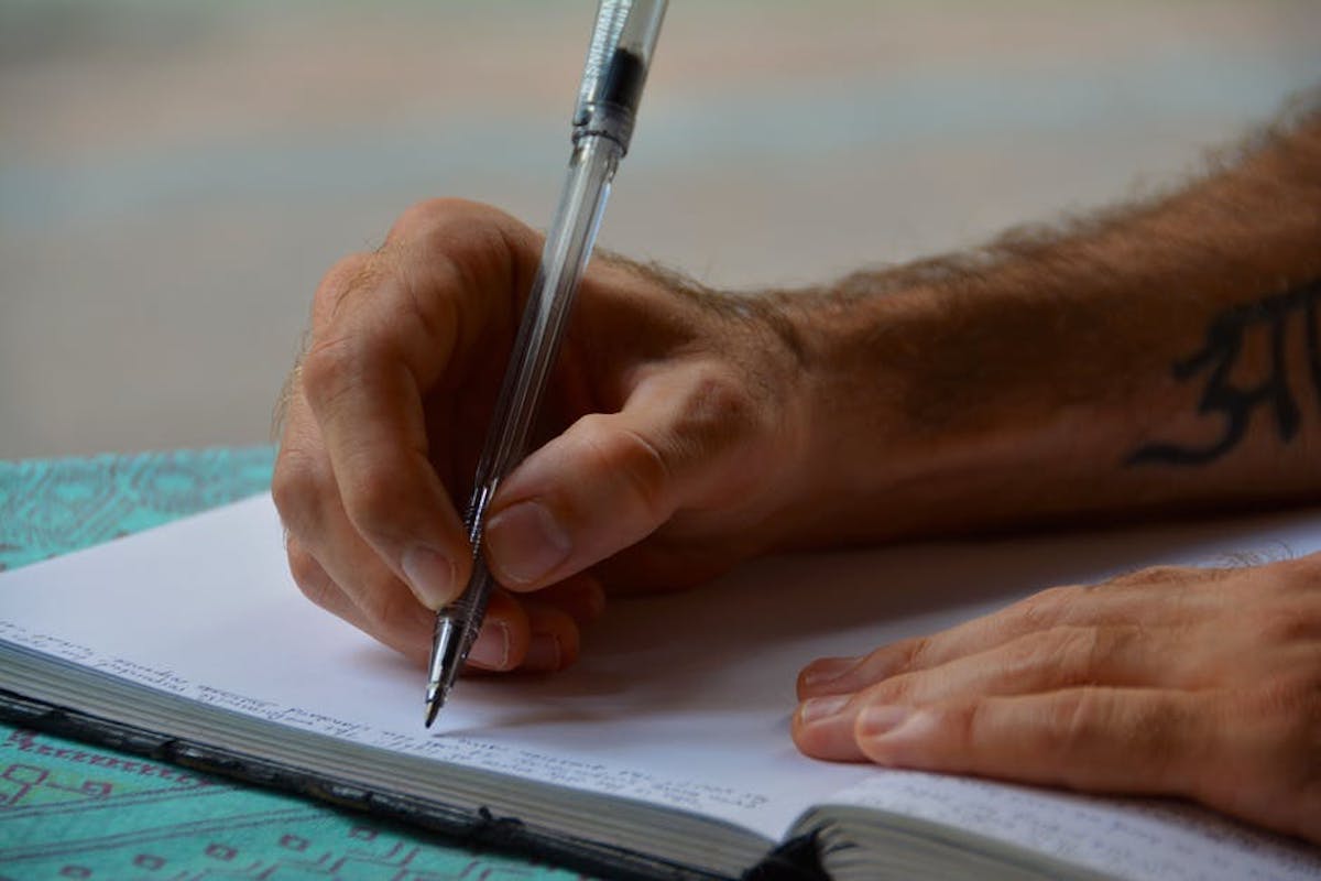 hands-writing-diary-journal-159774.jpg