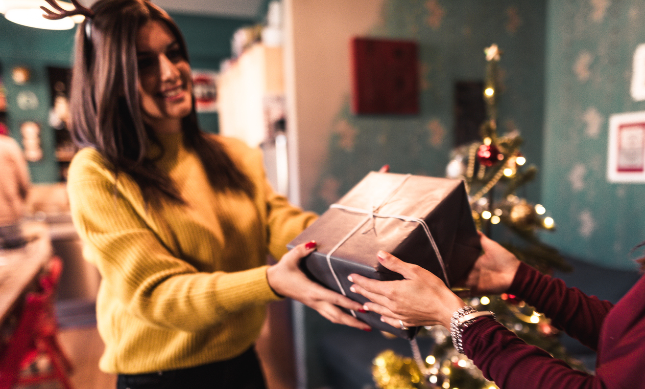 friends exchanging christmas presents