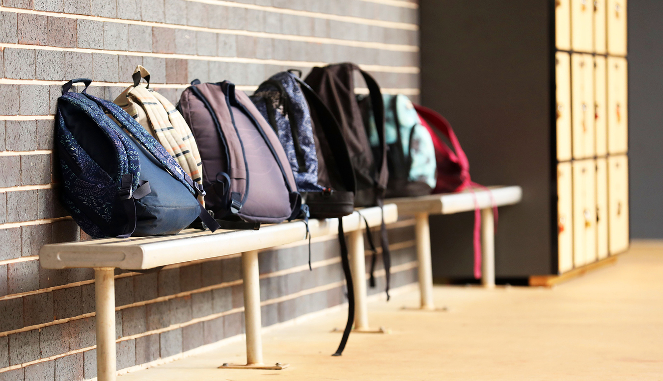 High School student school bags outside the classroom at an educational facility