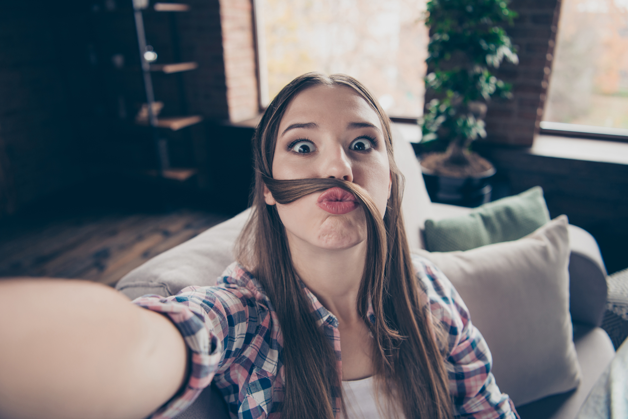 Closeup photo portrait of funny excited rejoicing adorable comedian sweet she her crazy girl make take selfie on smartphone holding hands