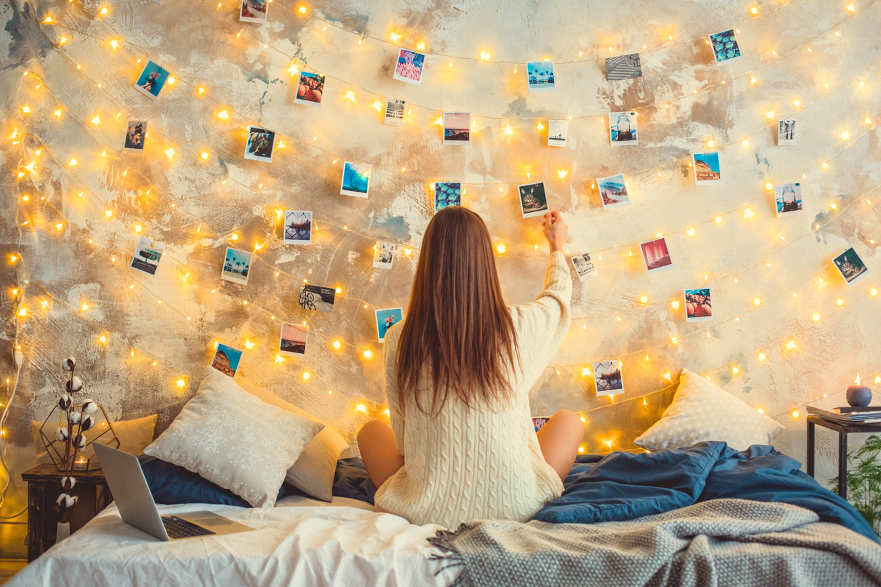 Young woman weekend at home decorated bedroom nostalgia