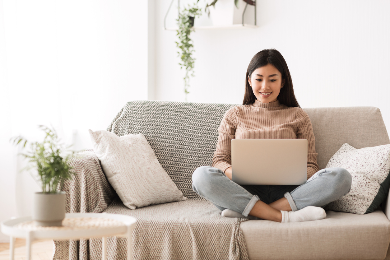 Girl Browsing Work Opportunities Online on Laptop