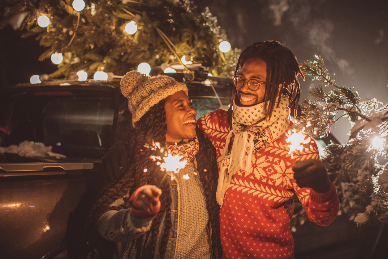 Perfect Christmas tree arrival celebrated with sparklers