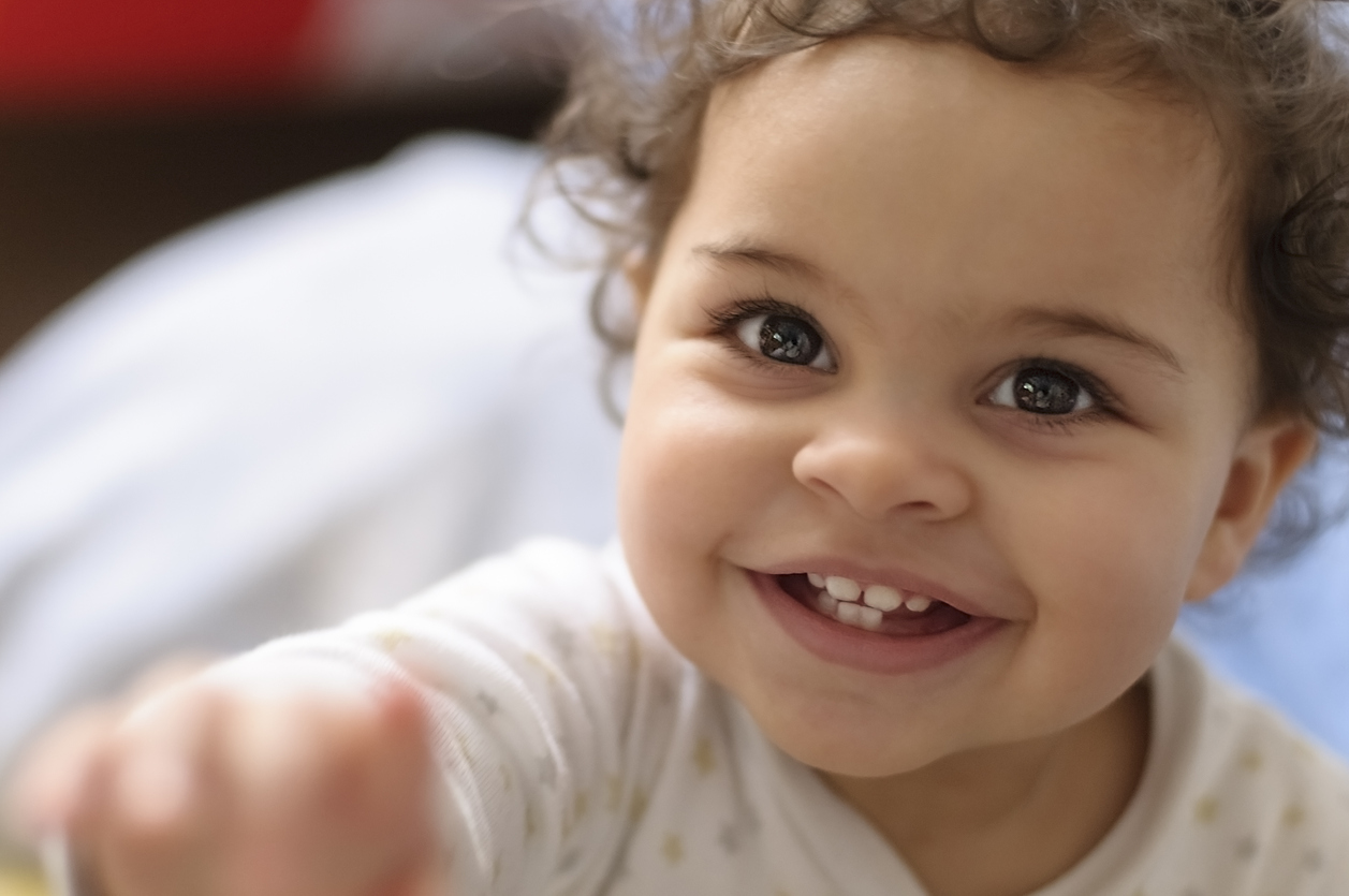 Headshot of Smiling Baby Girl