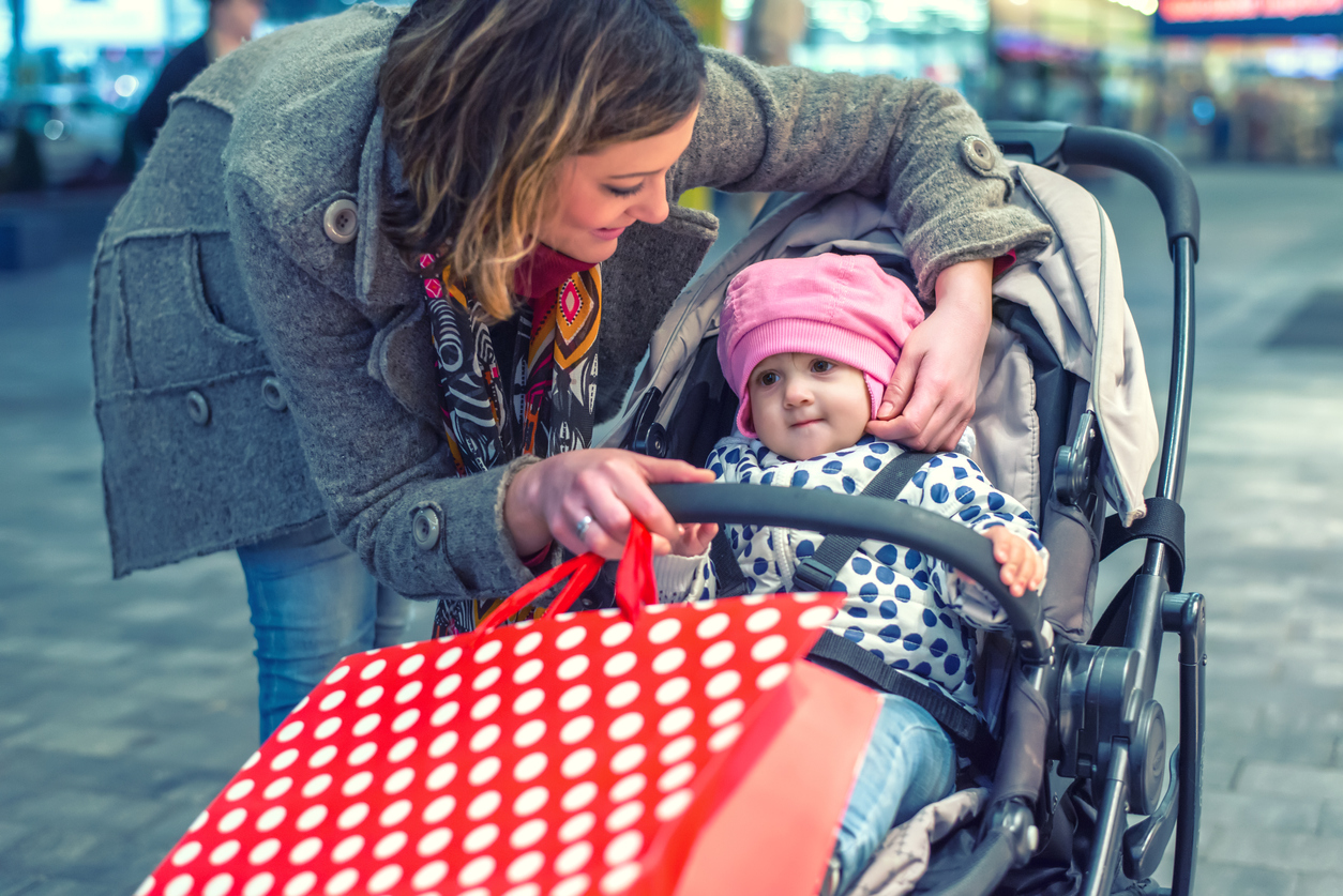 Woman with her baby in a shopping mall