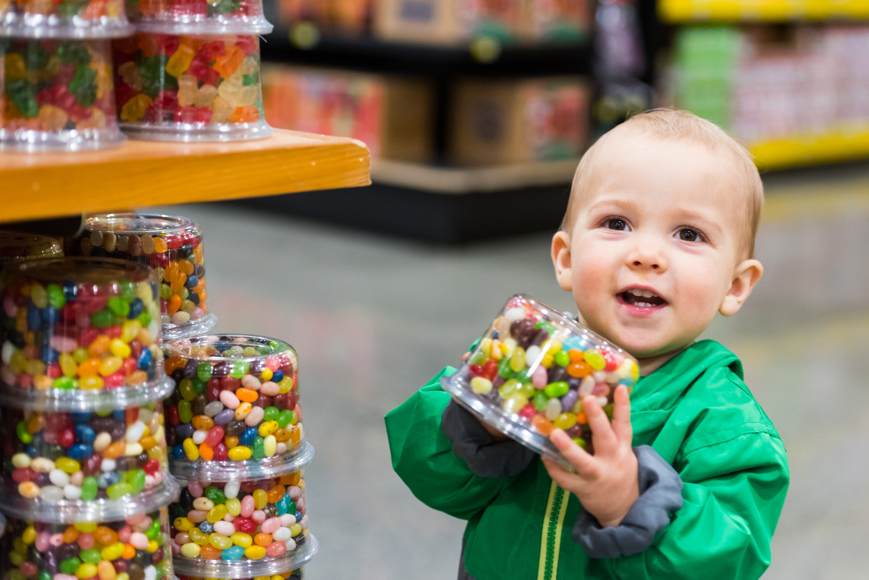 Baby Boy shopping for candies