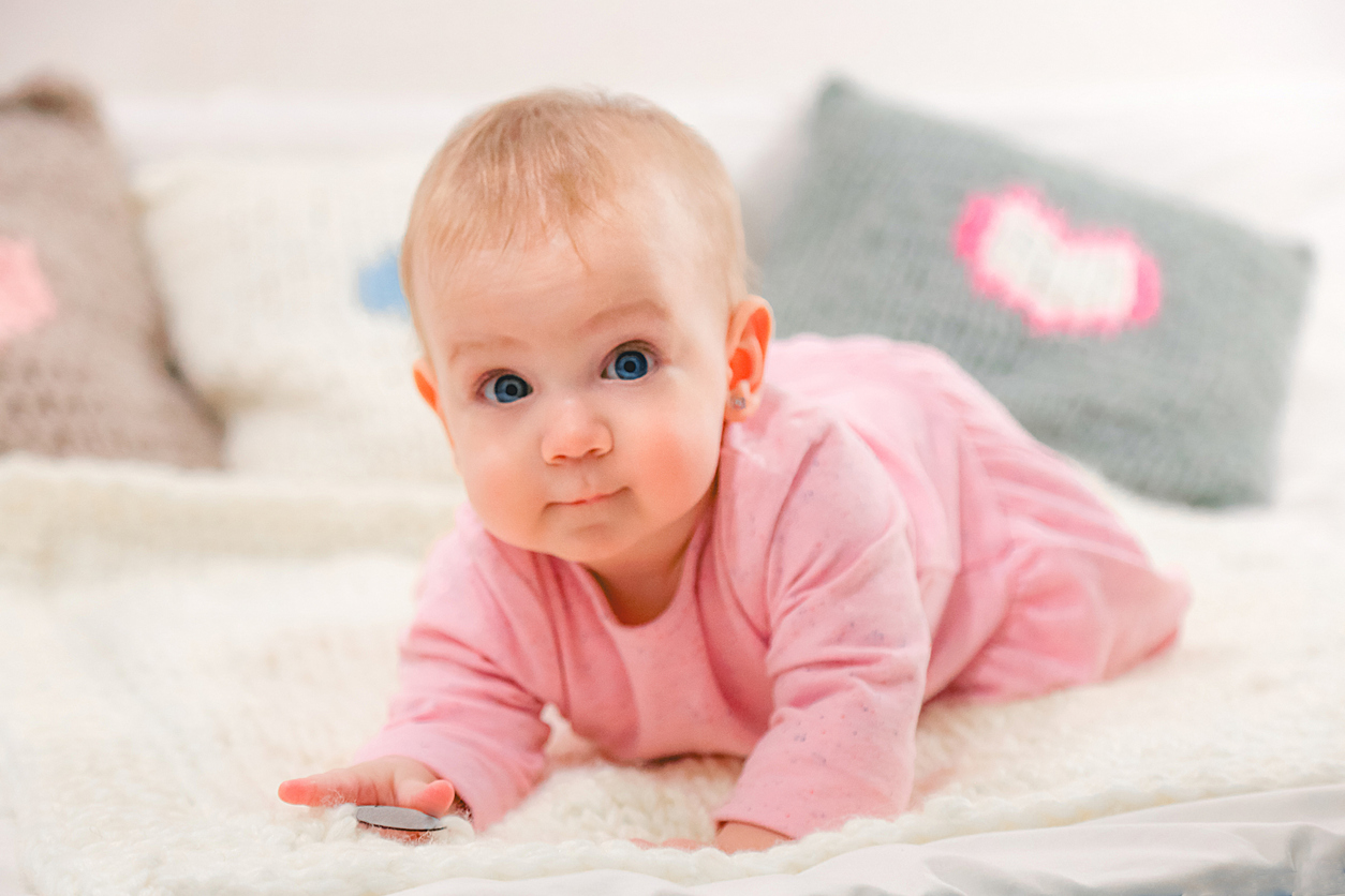 Newborn baby girl in pink