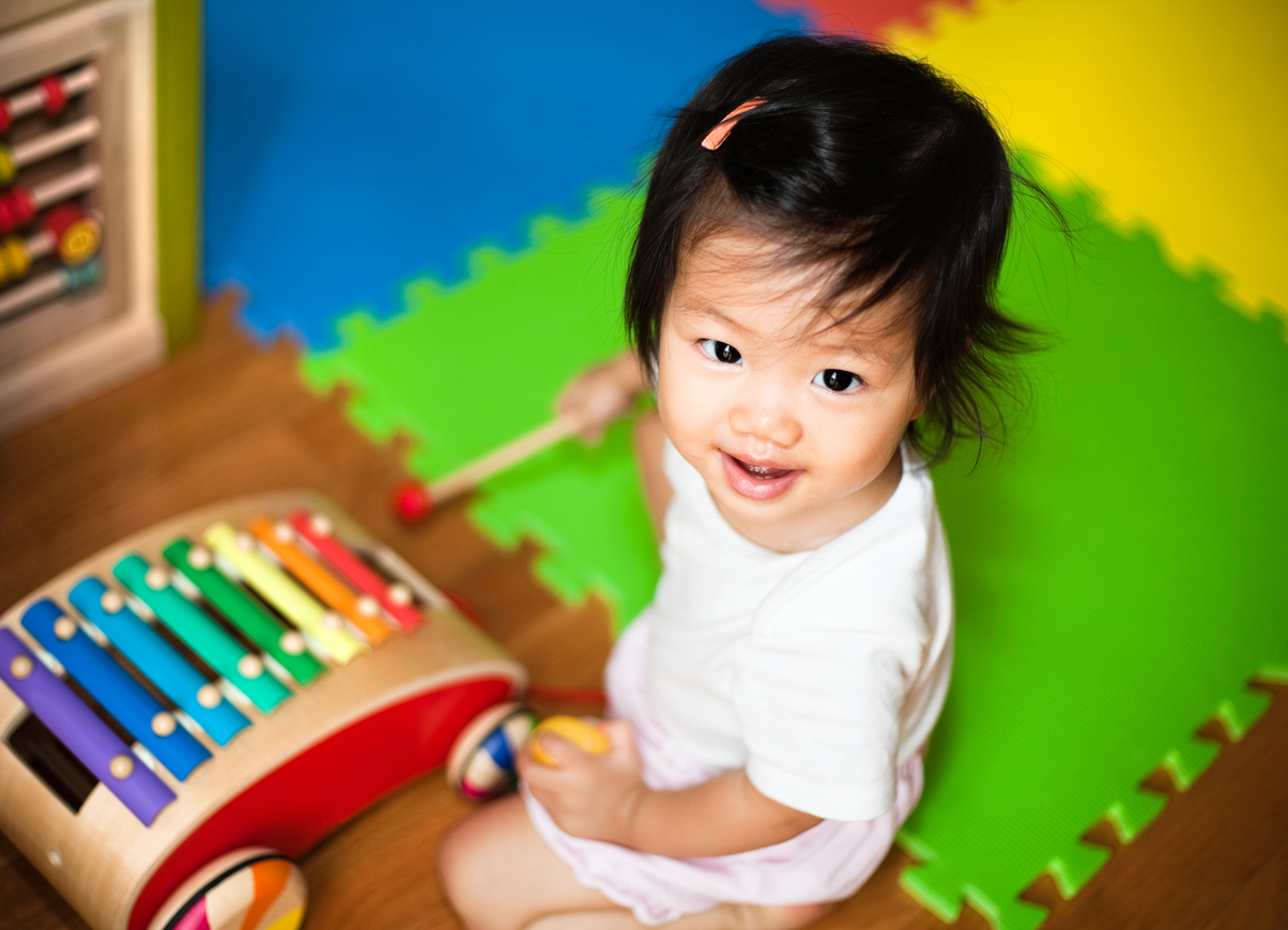 Cute Asian Baby Girl Playing