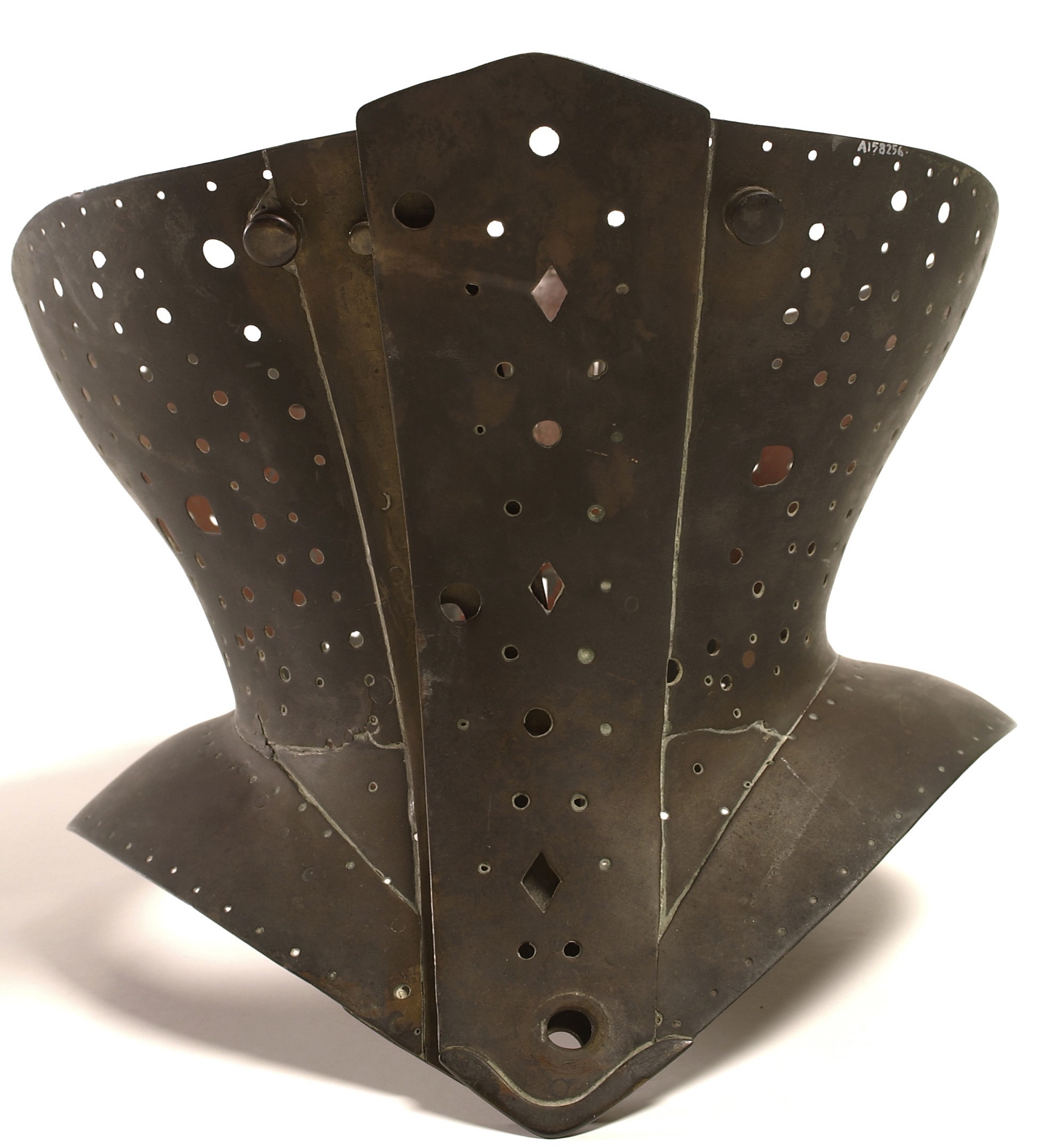 L0035600 A brass corset used to minimise the waist