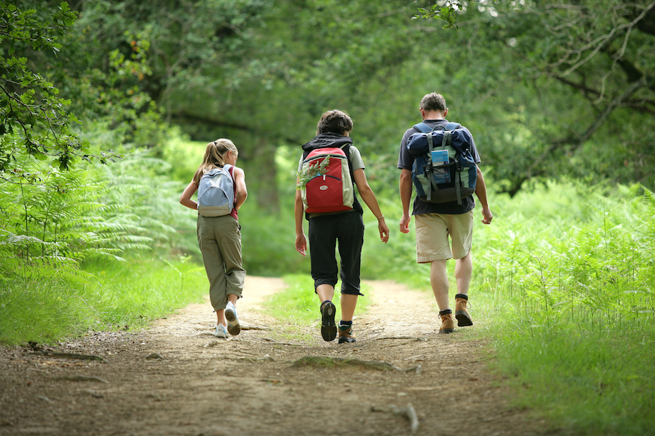 small family on a path