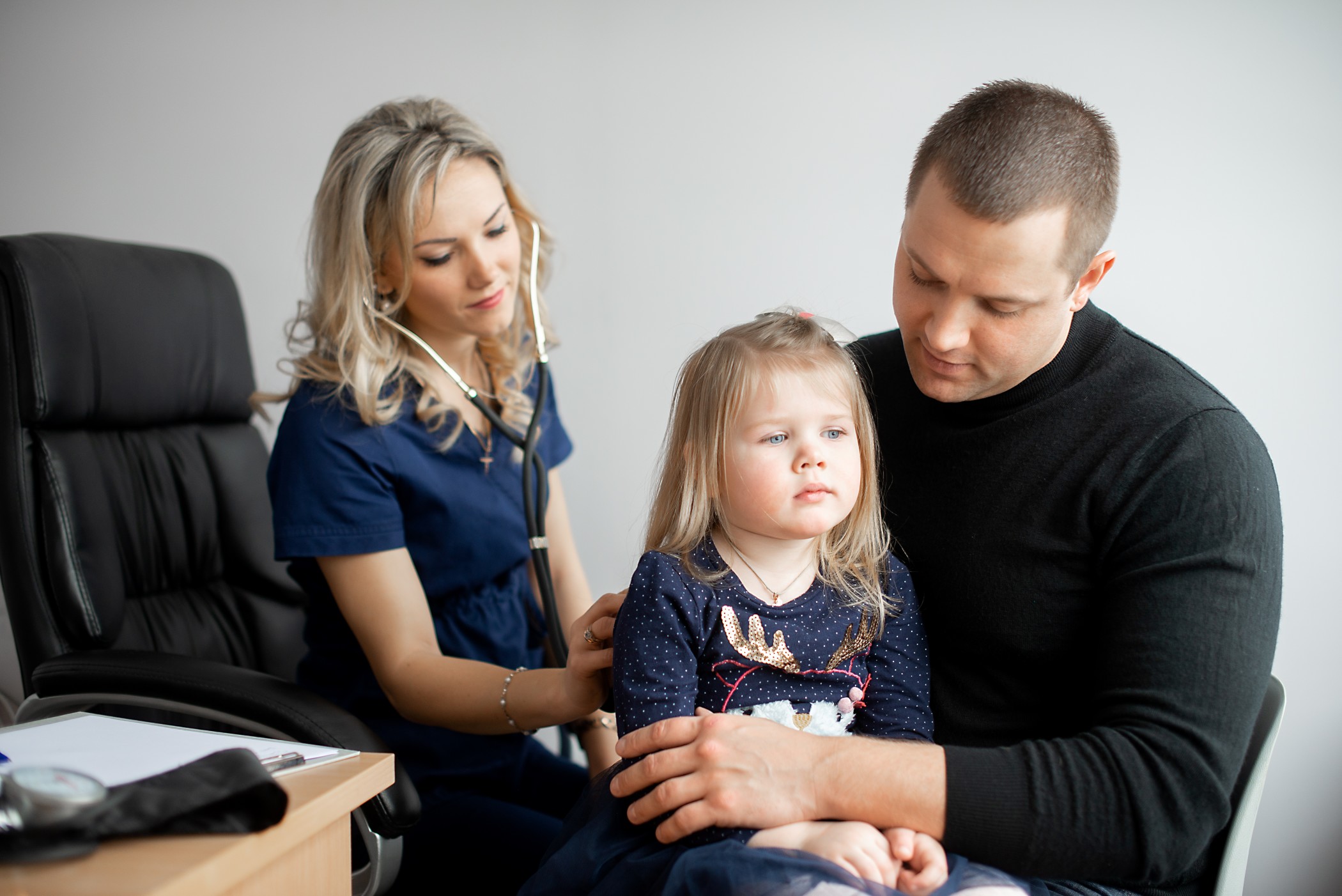 kind-and-friendly-doctor-pediatrician-with-stethoscope-listening-little-girl-heart-beat-and_t20_oR3dPR.jpg