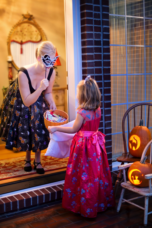 little-girl-trick-or-treating-on-halloween.jpg