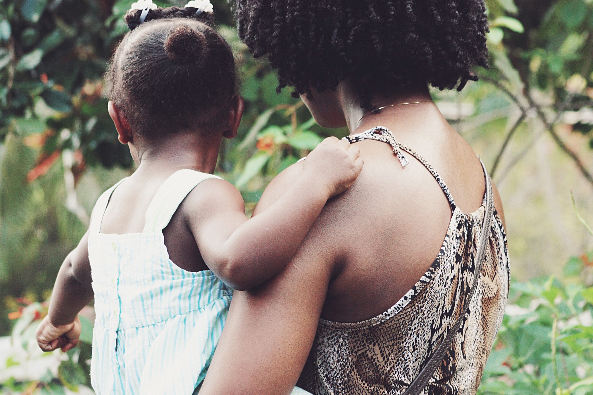 mother-carrying-daughter_t20_ywBkB6.jpg