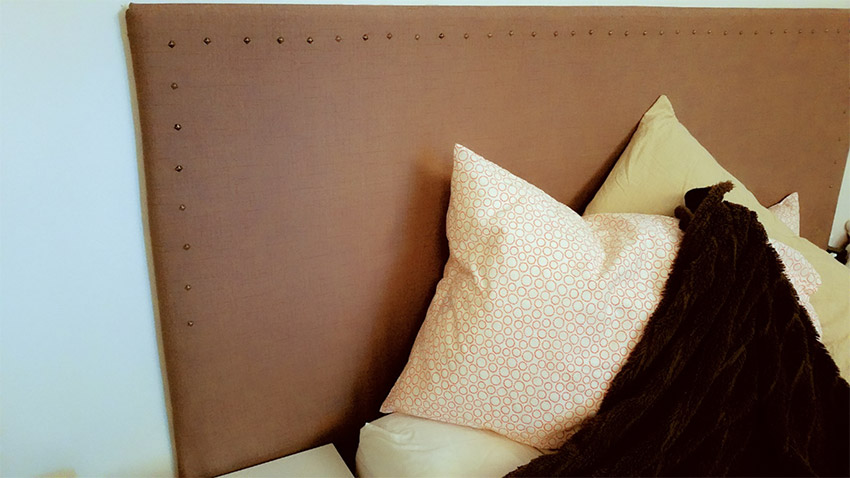 nailhead-upholstered-headboard-idea.jpg