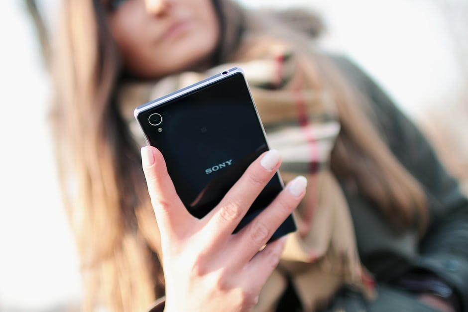 person-woman-hand-smartphone.jpg