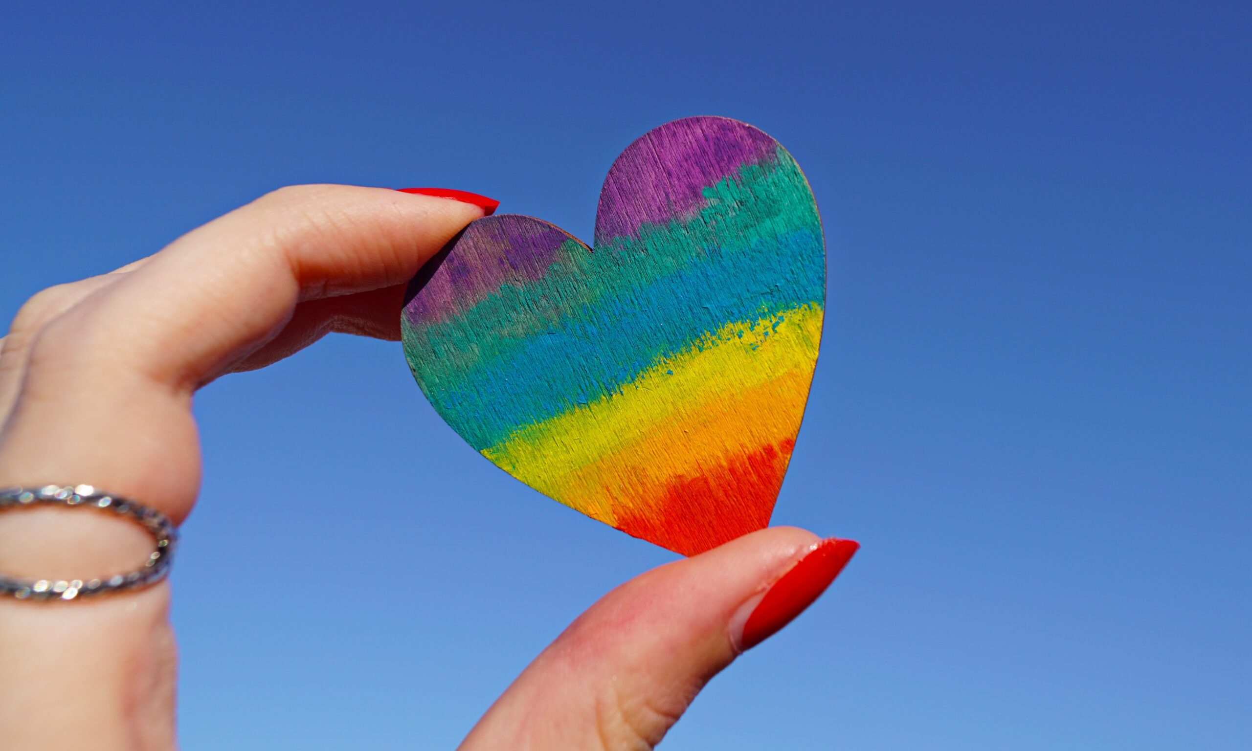 photo-of-person-holding-multicolored-heart-decor-1173576.jpg