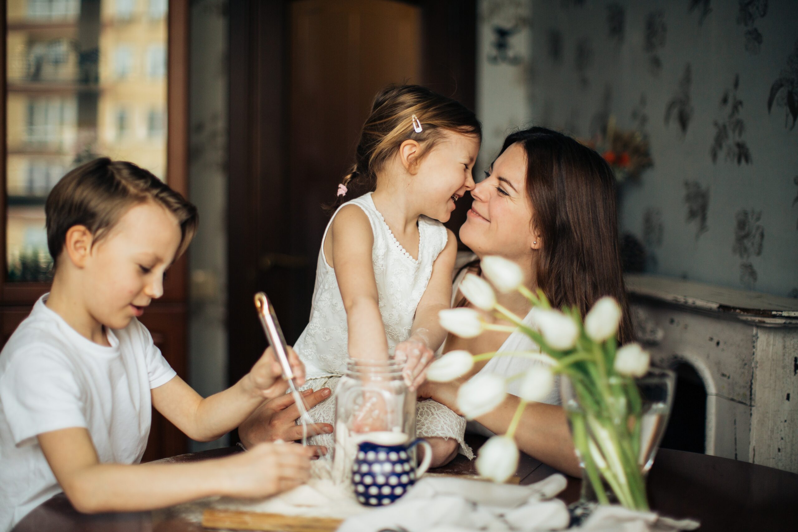 photo-of-woman-playing-with-her-children-3806953.jpg